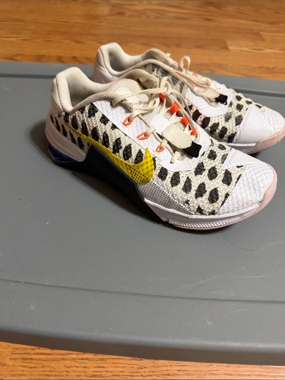 Nike White Leopard Print Sneakers with Yellow Swoosh and Black Accents